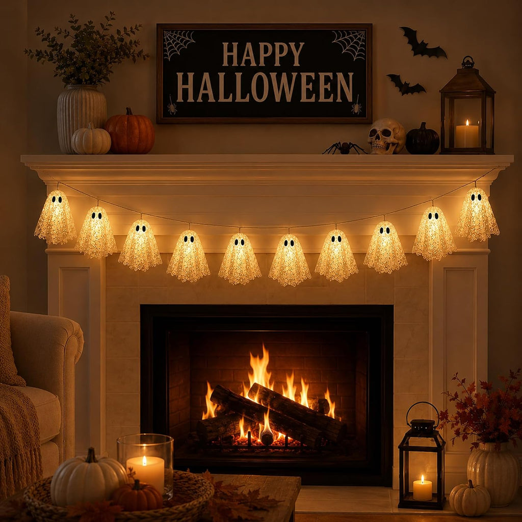 Halloween ghost garland on fireplace mantel