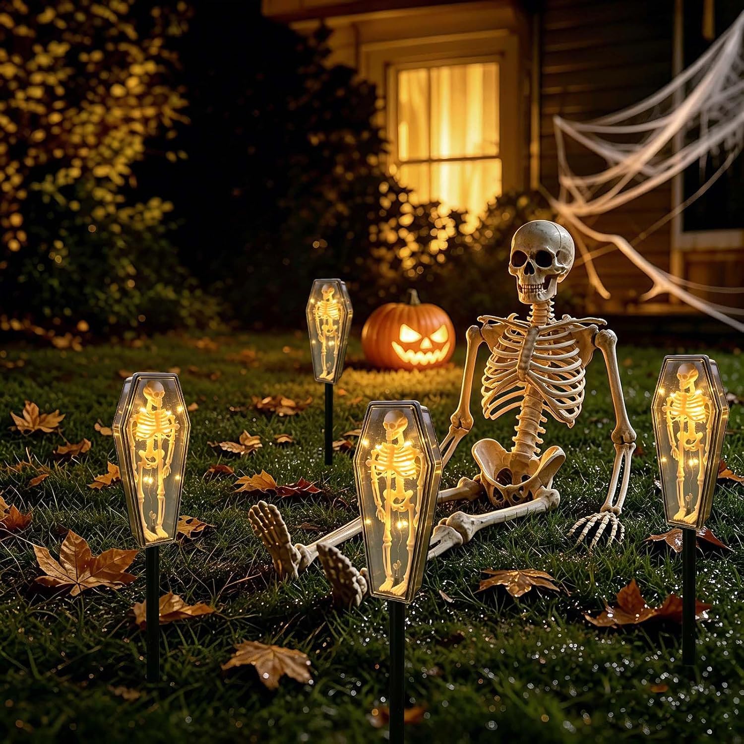 Skeleton coffin lights on lawn display